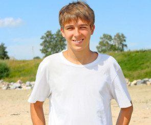Teen standing on a beach